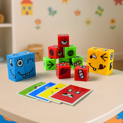 A grouping of emotion cubes in various colors and matching cards are displayed on a light wooden table with a blurred