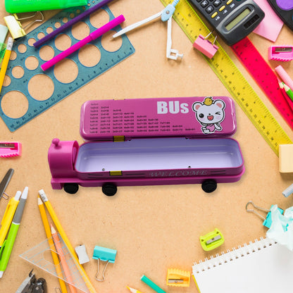 Open pink bus pencil case with a multiplication table on the lid, surrounded by school supplies on a wooden desk.