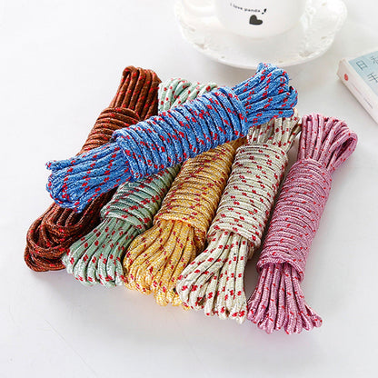 Six coiled ropes in various colors: brown, light green, cream, blue, yellow, and pink, on a white surface.