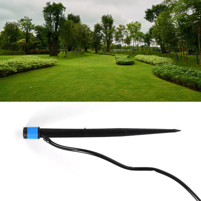 A black and blue water dripper with a thin black hose, with an upper image of a lush green park with trees and manicured