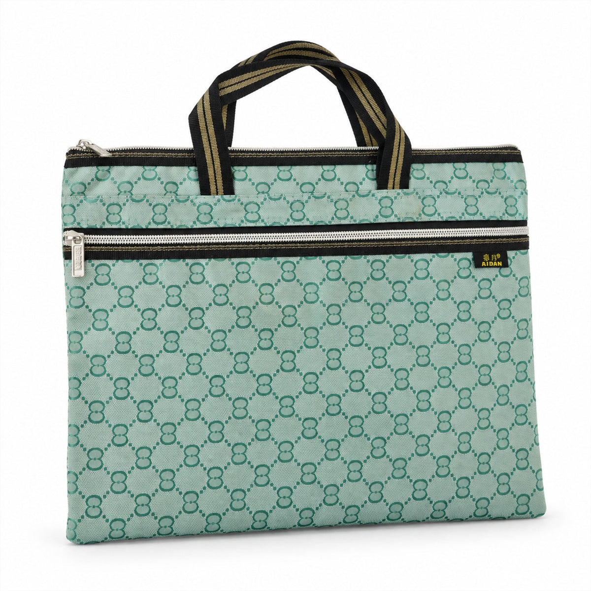 A green patterned document bag with black and gold striped handles and two zippered pockets, standing upright on a white