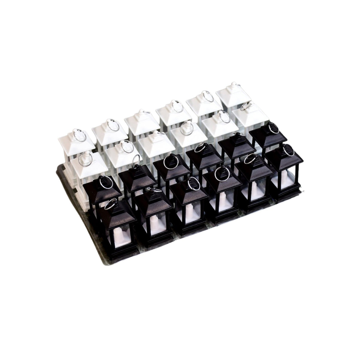 Twenty-four miniature black and white LED candle lanterns, arranged neatly on a clear plastic tray against a white