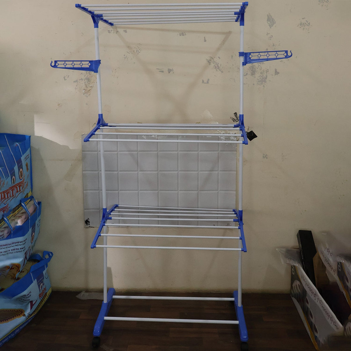 Live photo of 3 layer foldable clothes drying stand