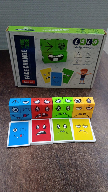 A product box for a "Face Change Rubik Cube" is shown with a line of colorful emotion cubes and matching cards below it.