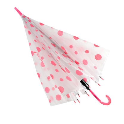 A partially closed white umbrella with pink polka dots and a pink handle is angled on a white background.