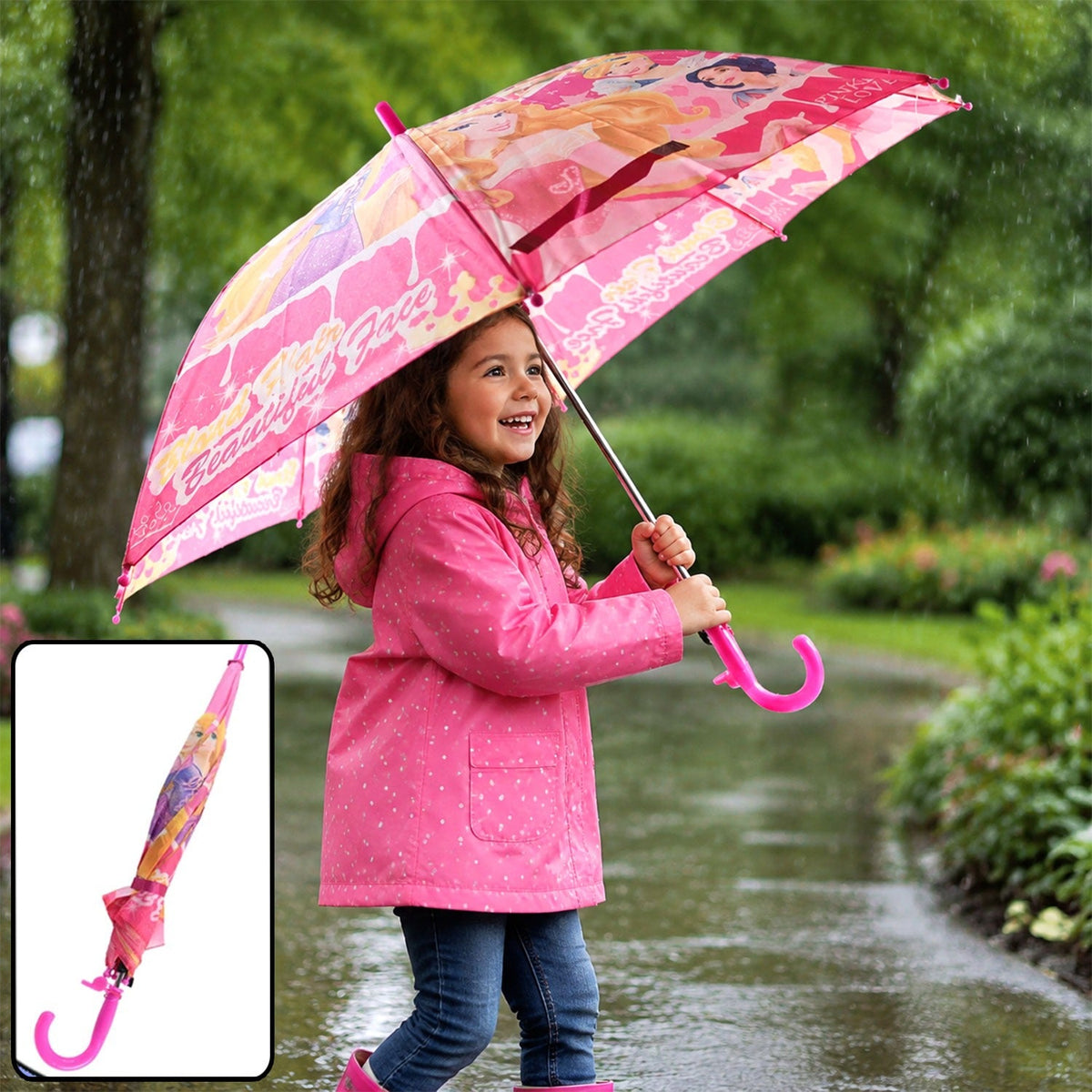 A young girl in a pink raincoat holds an open pink Disney Princess umbrella in the rain.