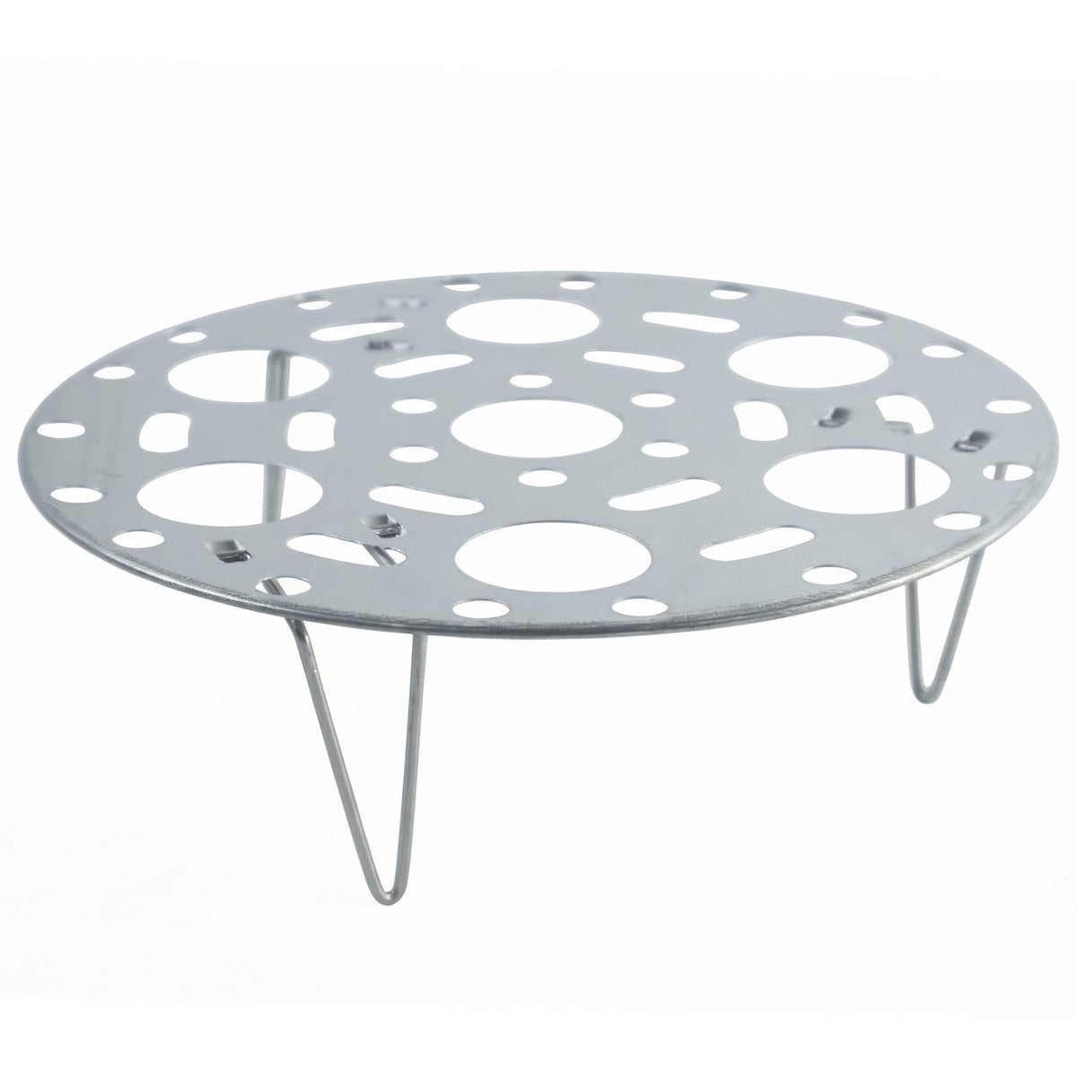 A round, perforated stainless steel steamer rack with three wire legs is displayed against a clean white background.