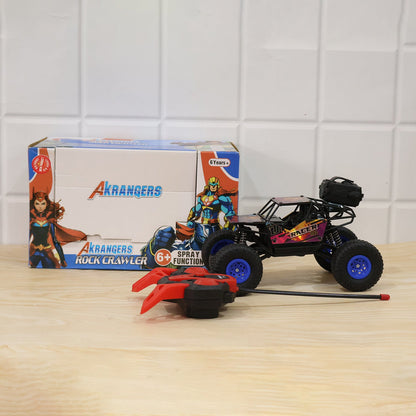 A black and purple remote control rock crawler, its remote, and an "Akrangers" branded box are displayed on a light wooden