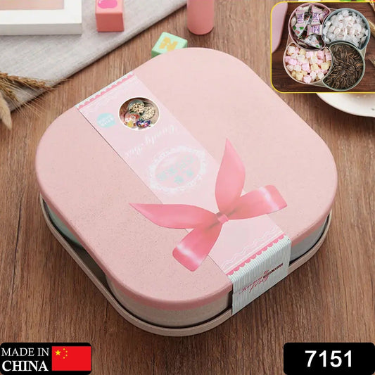 A pink-toned multi-compartment snack box, ideal for organized food storage.