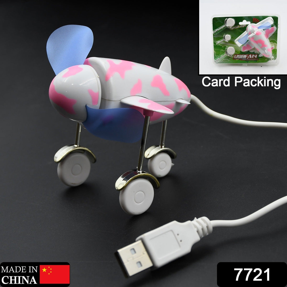A pink and white airplane USB fan with blue propellers and wheels is shown with its packaging in the background.